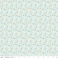 Floral pattern fabric swatch on a light blue background