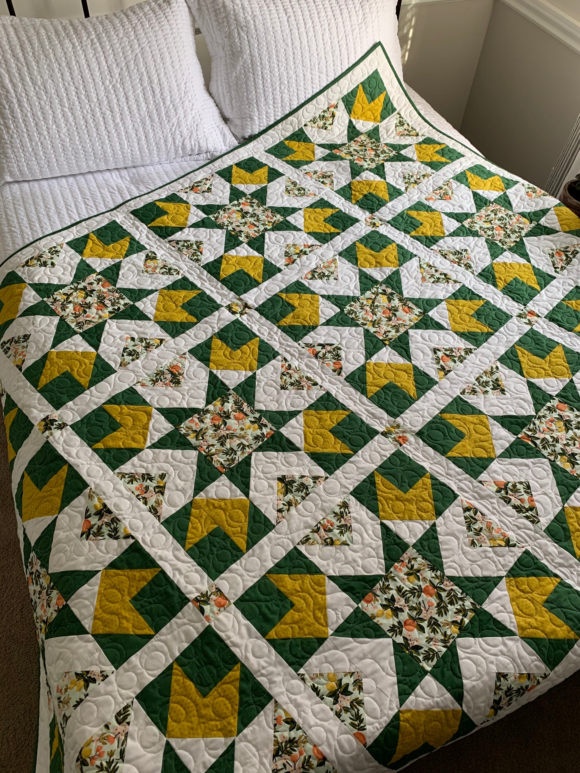 Louisa Quilt on a bed - Splendid Speck