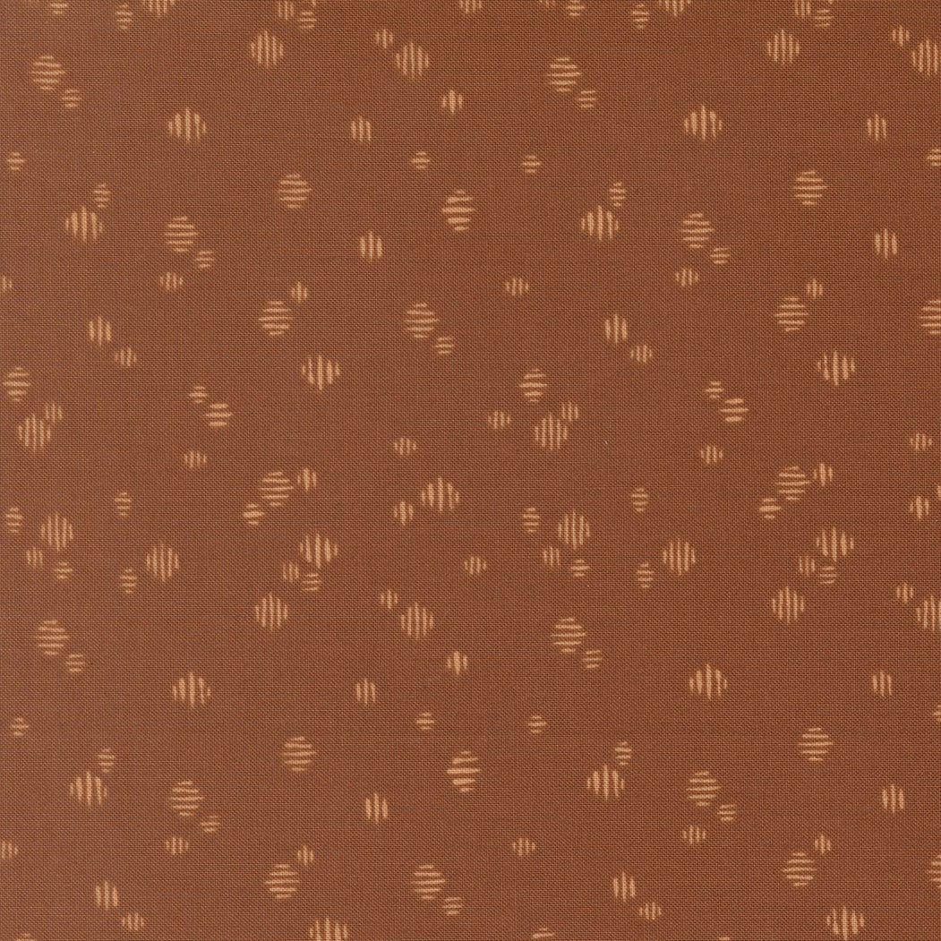 Brown fabric texture with small geometric pattern
