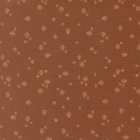 Brown fabric texture with small geometric pattern