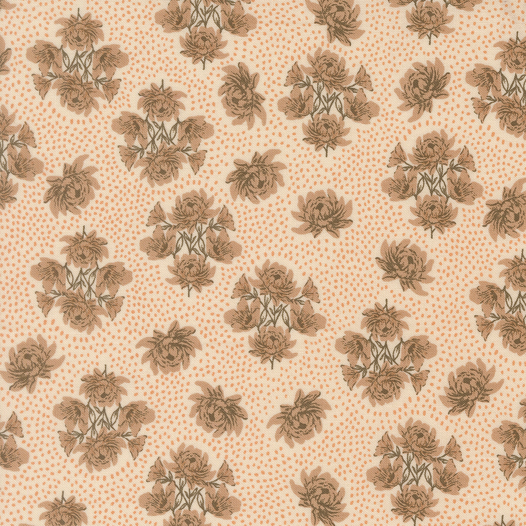 Patterned fabric with brown floral design on a beige background