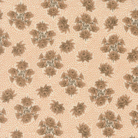 Patterned fabric with brown floral design on a beige background