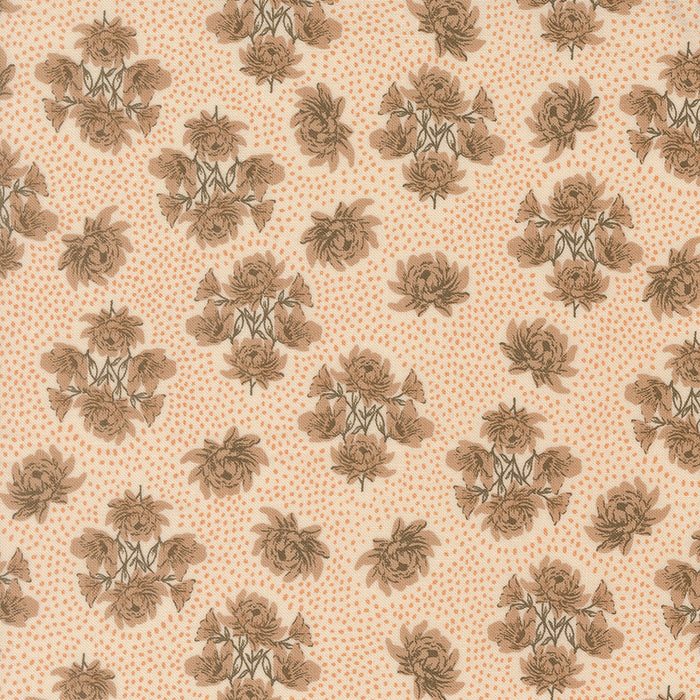 Patterned fabric with brown floral design on a beige background